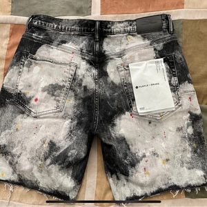 Purple Brand
style: P020 - cut off shorts,34, black bleached out paint splatter